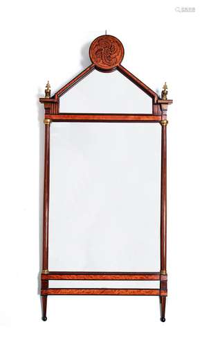 A German satinwood and gilt metal mounted mirror