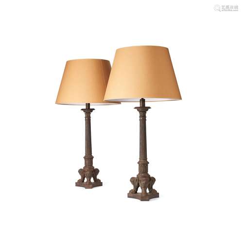 A pair of French cast iron lamp bases in Louis Philippe taste