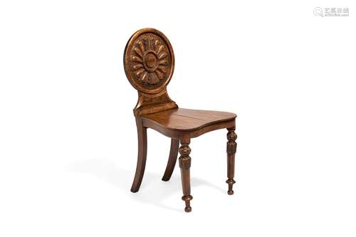 An early Victorian elm and burr elm hall chair