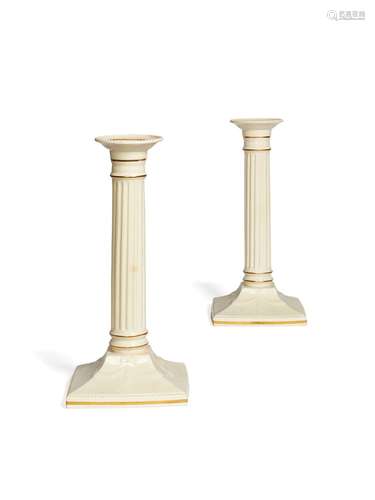 A large pair of Copeland creamware candlesticks