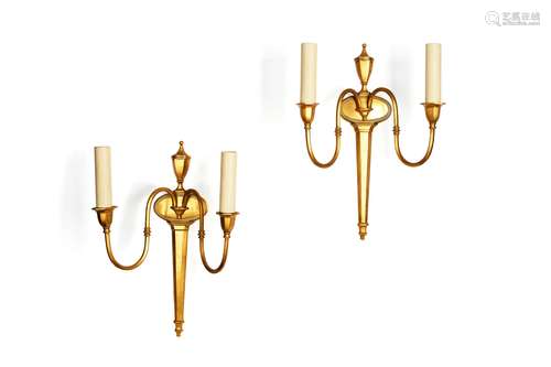 A pair of gilt metal twin light wall appliques in Adam taste