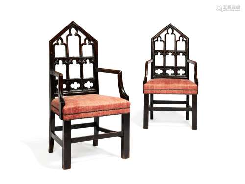 A pair of George III stained oak armchairs in Gothic taste