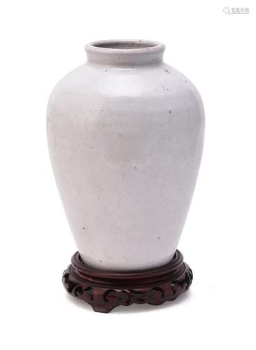 A white glazed stoneware vase