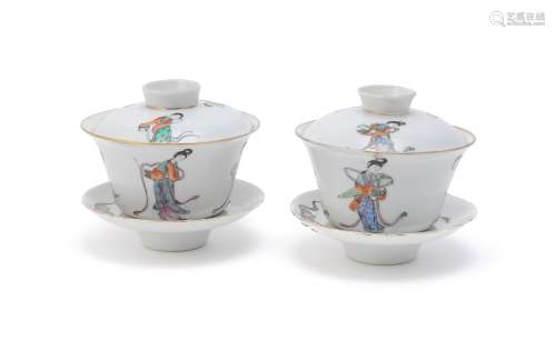 A pair of Chinese famille rose tea bowls and trays