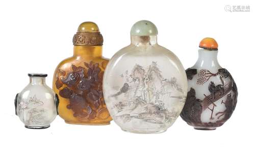 Y Y A group of four Chinese snuff bottles