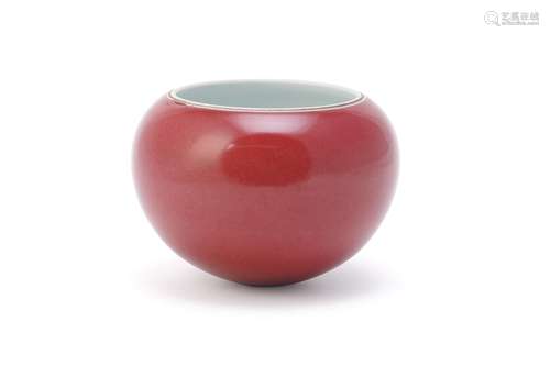 A Chinese red glazed bowl