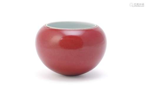 A Chinese red glazed bowl