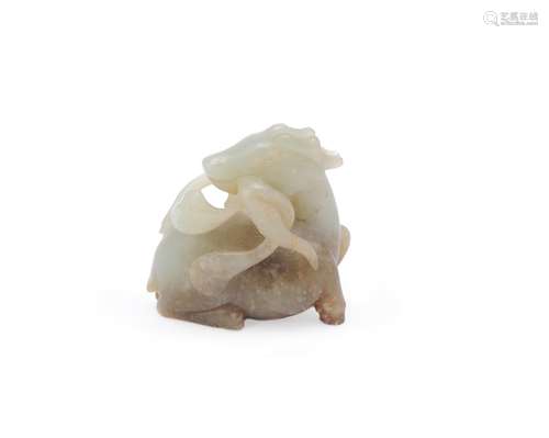 A Chinese celadon and russet jade carving of a deer