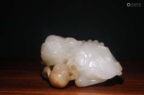 A Chinese Hetian Jade Lion Ornament