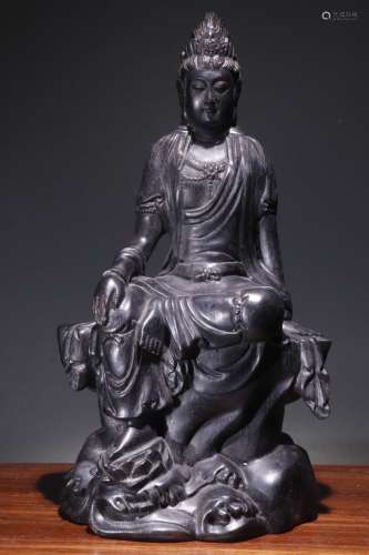 A Chinese Rosewood Guanyin Statue