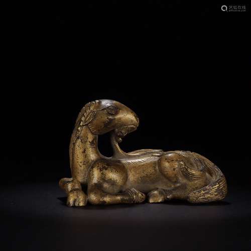 A Chinese Bronze Goat Paperweight With Gold Painting