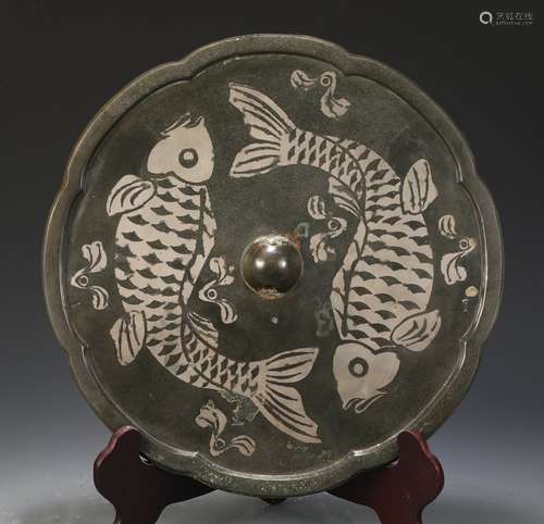 A Chinese Bronze Mirror With Silver