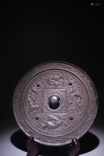 A Chinese Bronze Beast Pattern Mirror