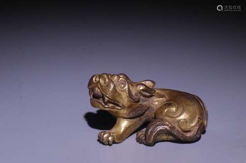 A Chinese Gilt Bronze Beast Paperweight