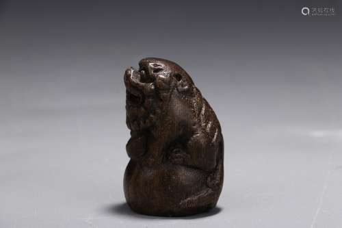 A Chinese Agarwood Lion Ornament