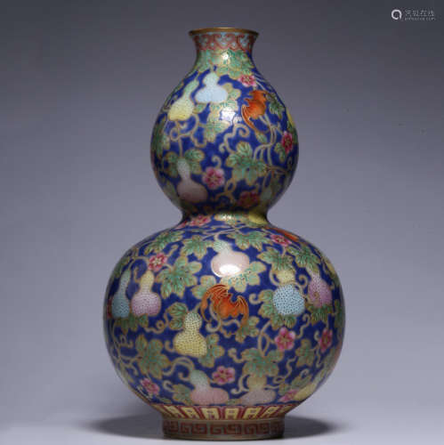 A Chinese Blue Ground Famille Rose Painted Porcelain Gourd-shaped Vase