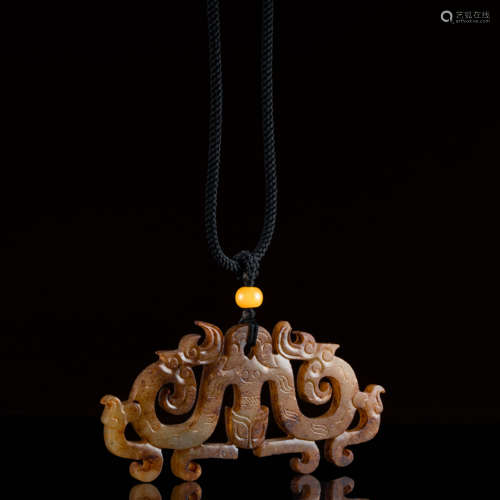 A Chinese Jade Piercing Dragon Pattern Pendant