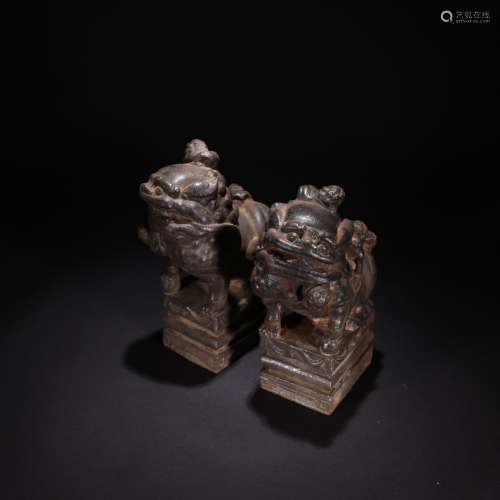 A Pair of Chinese Iron Lion Ornaments