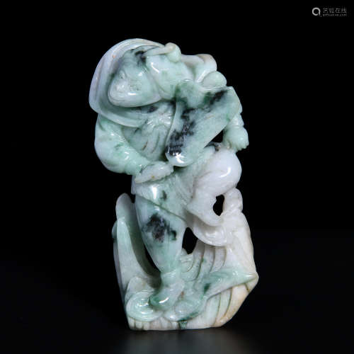 A JADEITE ORNAMENT  WITH CHARACTER