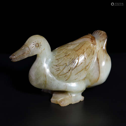 A WHITE JADE ORNAMENT SHAPED WITH GOOSE