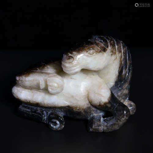 A WHITE JADE ORNAMENT SHAPED WITH HORSE