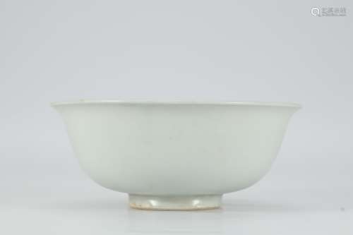 Yuan white glaze dark carved dragon bowl