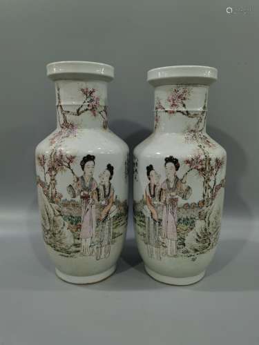 A pair of sticks and bottles decorated with light crimson color figures