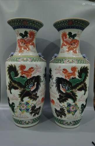 A pair of colorful lion clubs and bottles