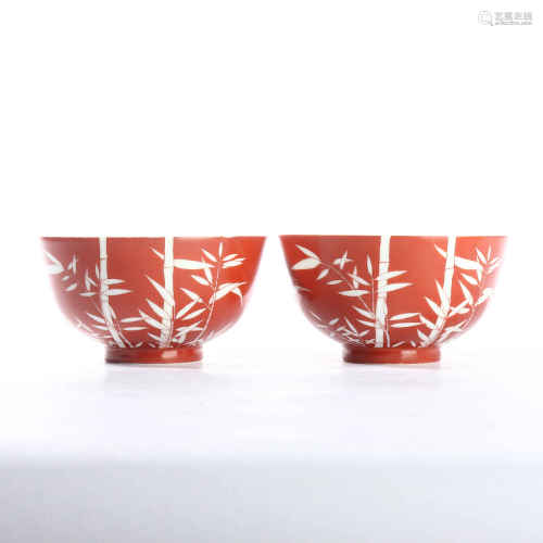 A pair of red glazed bamboo bowl