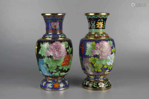 A pair of cloisonne flower and bird decorative bottles