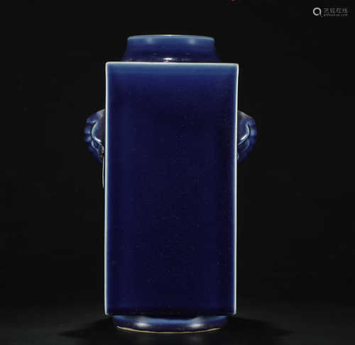 A BLUE GLAZE BOTTLE SHAPED WITH ELEPHANT EAR