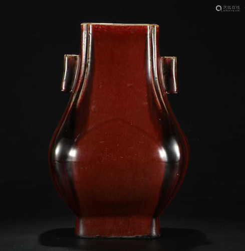 A RED GLAZE BOTTLE WITH PIERCED HANDLES