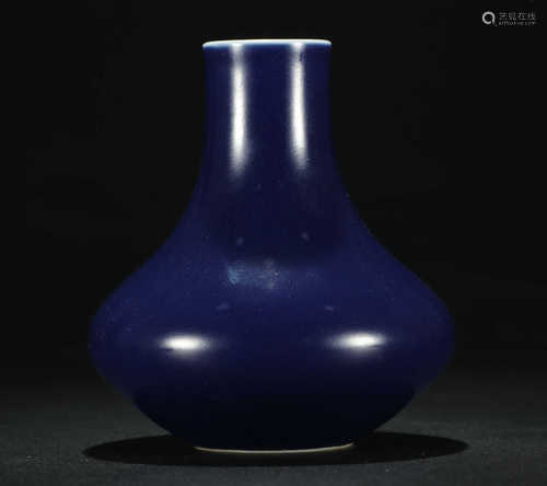 A BLUE GLAZE BOTTLE