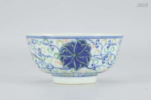 A bowl with lotus pattern and colorful twining branches in Guangxu of Qing Dynasty