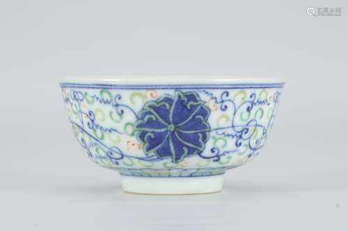 A bowl with lotus pattern and colorful twining branches in Guangxu of Qing Dynasty