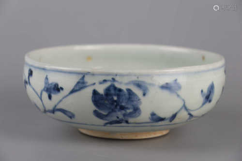 Large bowl decorated with blue and white flowers