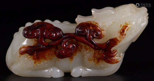 A HETIAN JADE CARVED BEAST SHAPE PENDANT