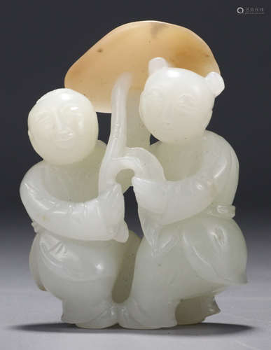 A HETIAN JADE CHILD SHAPE PENDANT