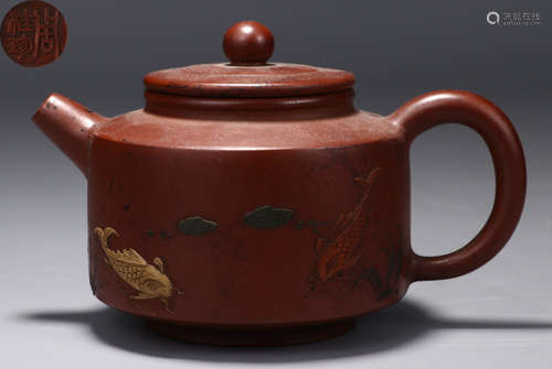 A FISH PATTERN ZISHA POT MADE BY ZHOUGUIZHEN