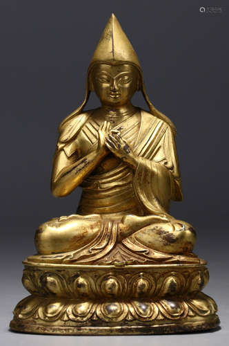 A GILT BRONZE TSONGKAHAPA BUDDHA STATUE