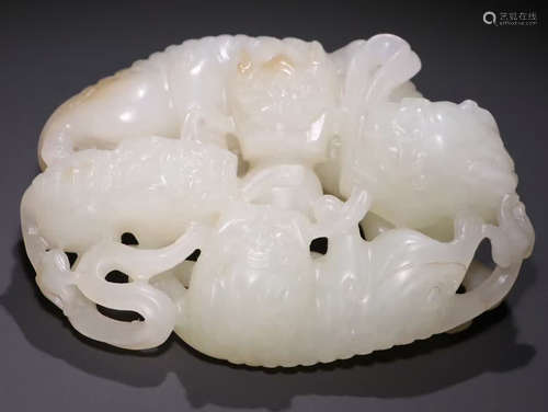 A HETIAN JADE CARVED LION PATTERN PENDANT