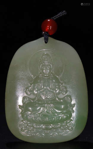 A HETIAN JASPER CARVED GUANYIN PATTERN PENDANT