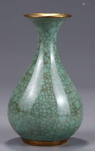 A LONGQUAN YAO GLAZE WRAPPED GOLD VASE