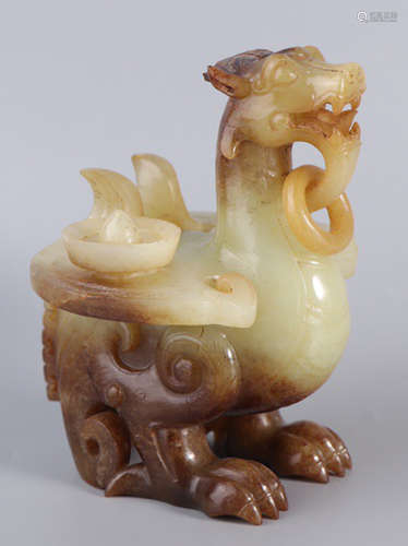 A HETIAN JADE CARVED BEAST SHAPE CANDLE HOLDER