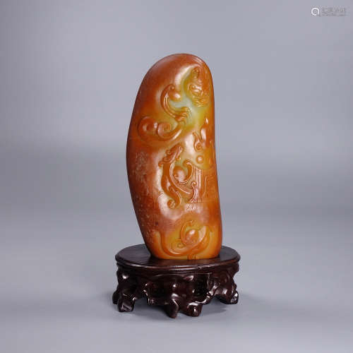 A Hetian Jade Seed Ornament With Base