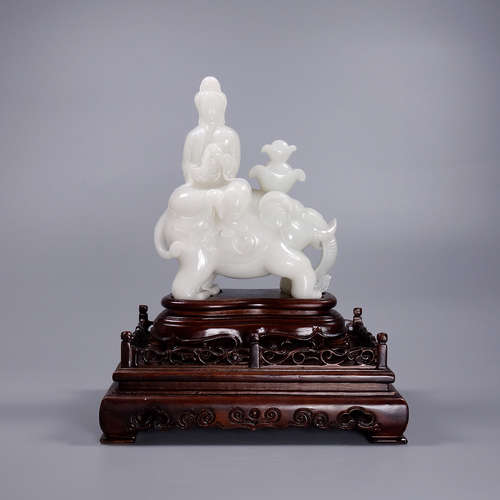 A Hetian Jade Guanyin Ornament With Base