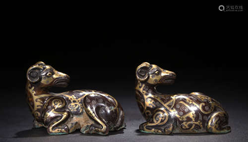 PAIR OF GILT BRONZE CAST 'RAM' RECUMBENT FIGURES