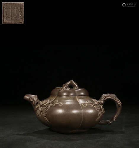 YIXING ZISHA LOBED 'PLUM FLOWERS' TEAPOT