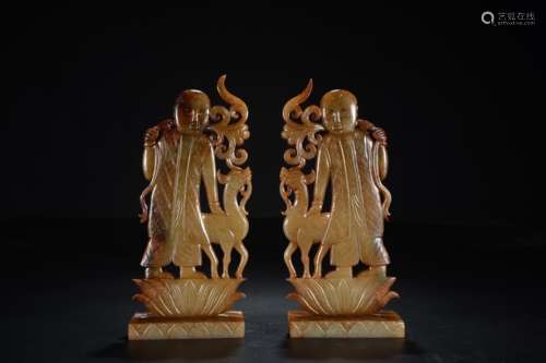 PAIR OF HETIAN JADE OPENWORK CARVED 'CHILD AND DEER' PLAQUES