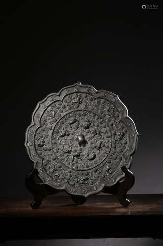 ARCHAIC BRONZE CAST AND LOBED MIRROR